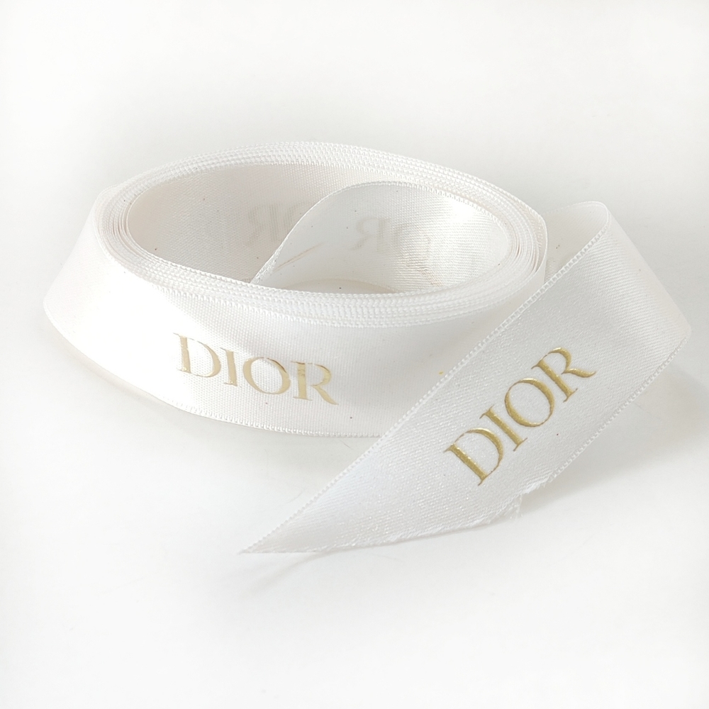 Dior ribbon, 1 inch wide, white and gold.